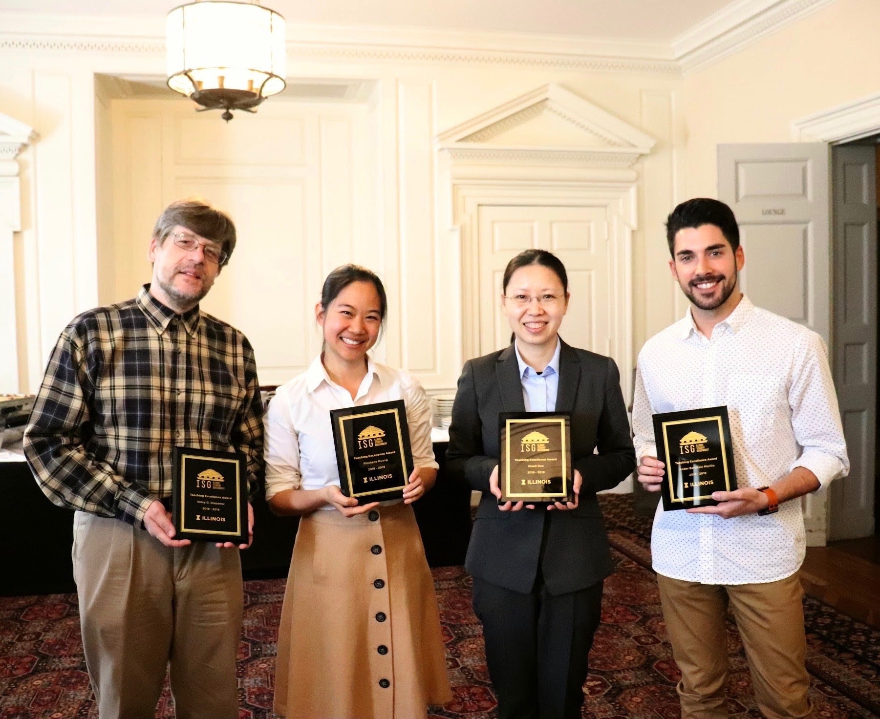 From left to right: Dr. Alexey Stepanov (Dept. of Statistics), Dr. Pinshane Huang (Dept. of Materials Science and Engineering), Dr. Xiaoli Guo (Dept. of Political Science) and Ander Beristain (Dept. of Spanish and Portuguese).