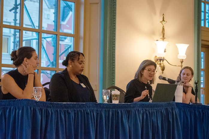 Four female panelists participating in discussion