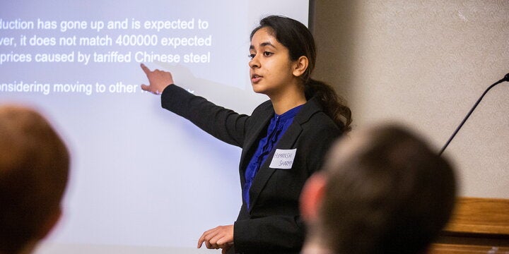 Student presenting research