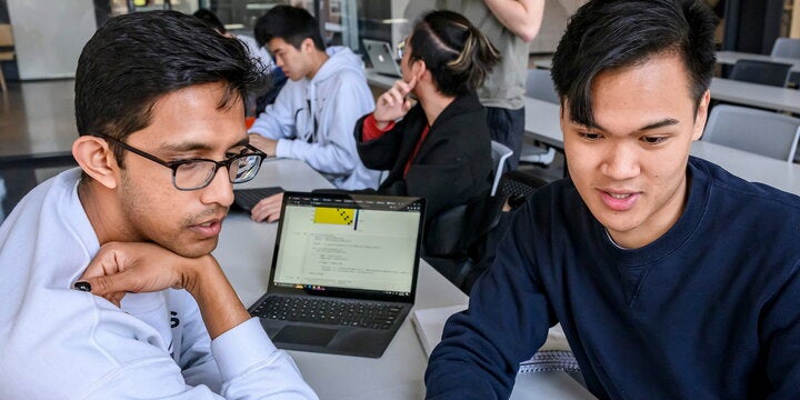 Students working on computer
