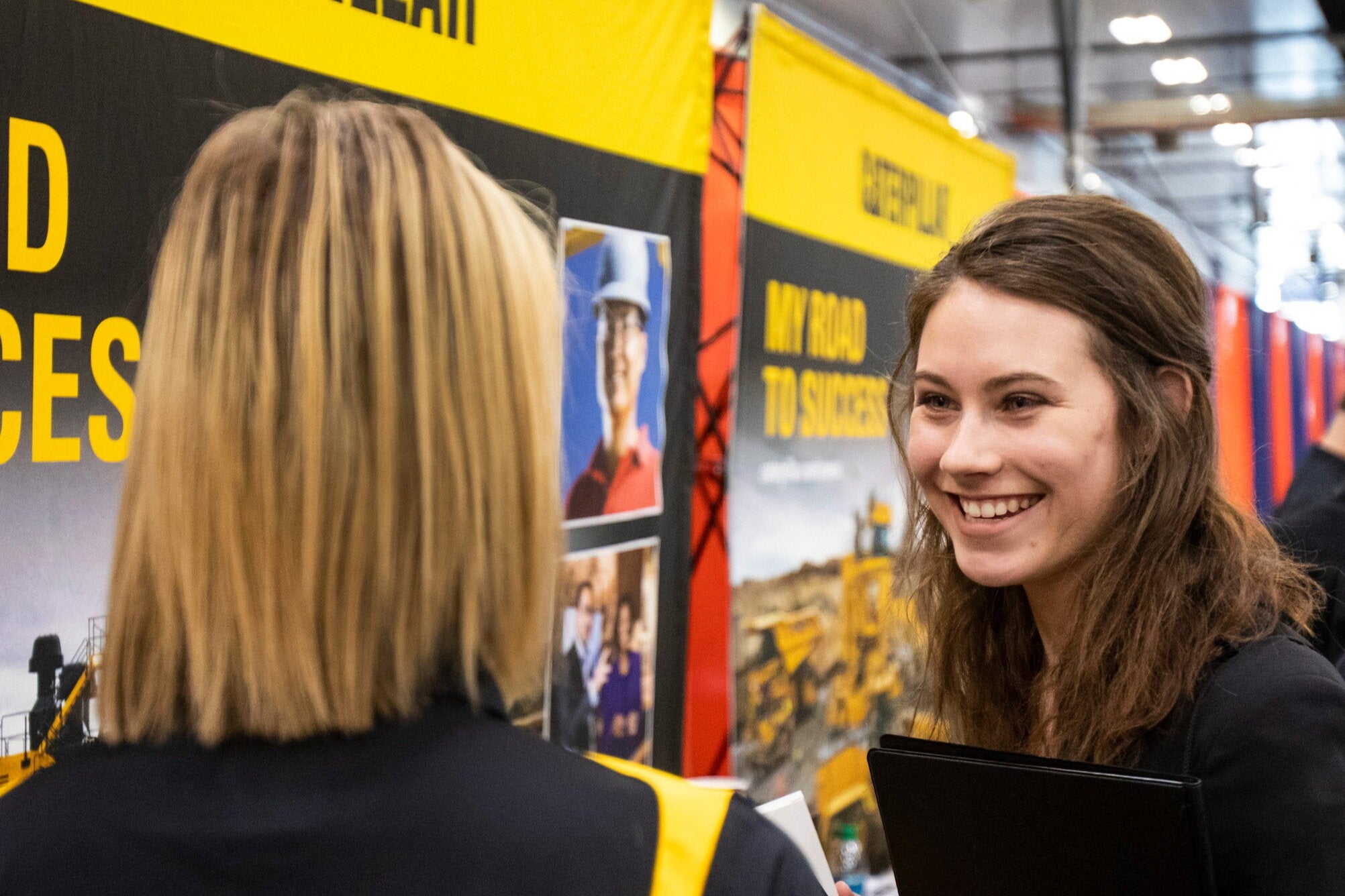 Student at career fair meeting with recruiter